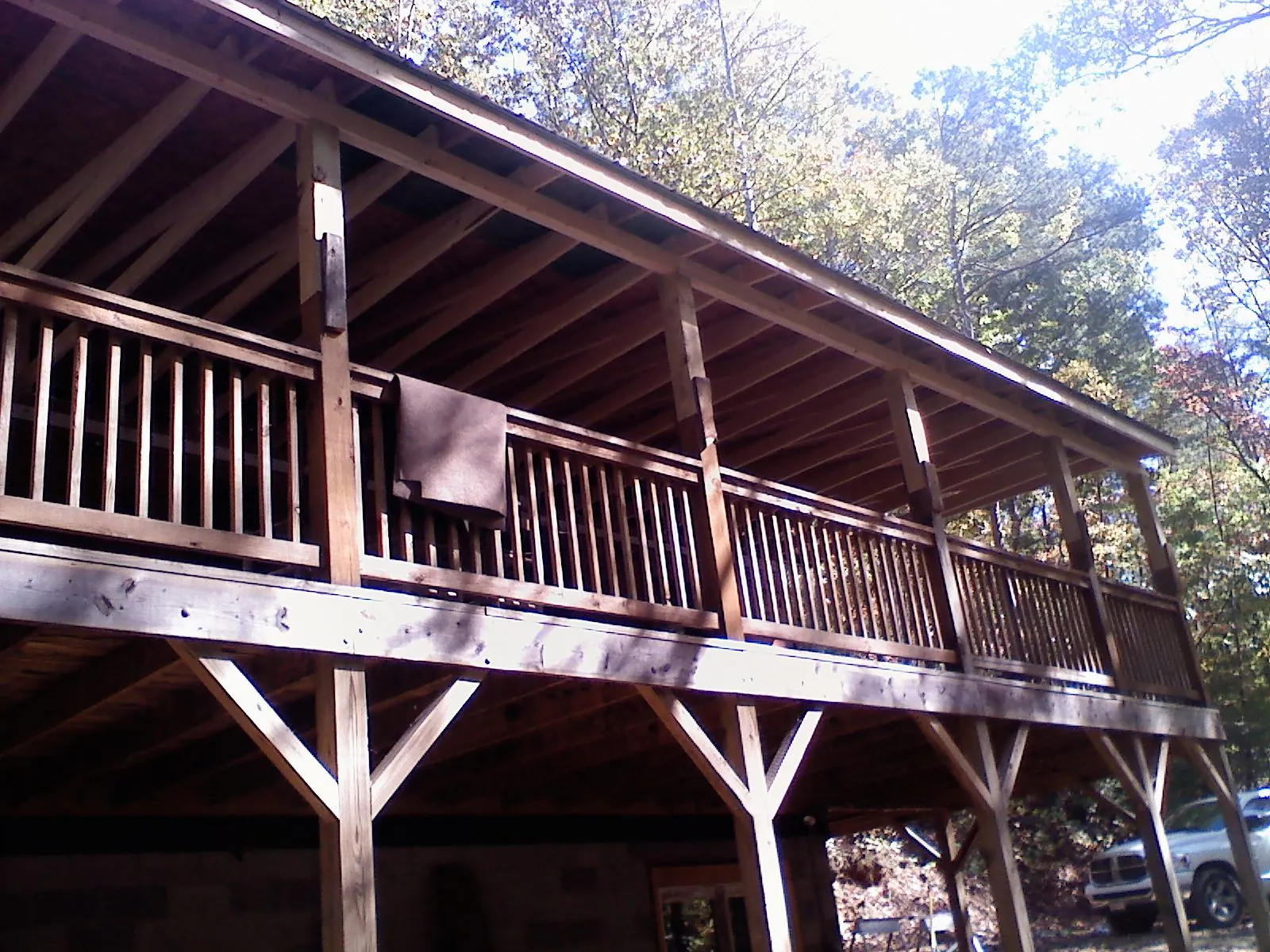 Timber framing under a new elevated porch and deck — Roof Leak Repair in Dougherty by Roofing Brothers